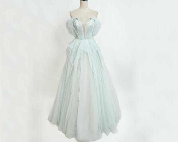 ethereal prom dresses A Line V-neck Lace Floor-length Backless Dress with Appliques while the sweep train flows gracefully behind you Andrea and Leo A1399 -