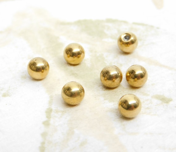 Gold belly bar ball discount