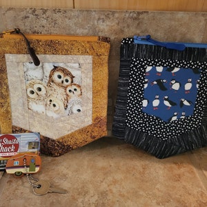 Astuccio/borsa tascabile trapuntata con stampa di gufo o pulcinella di mare