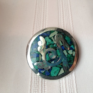 Broche o colgante vintage mexicano de plata esterlina con incrustaciones de turquesa