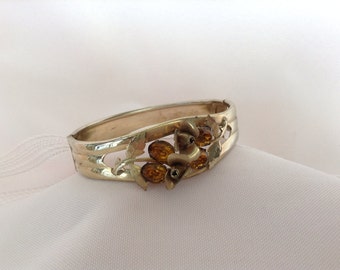 Art Deco Gold Bangle Bracelet with Amber colored Stones Flowers