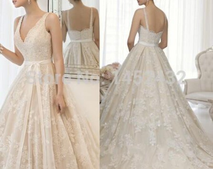 Discount Newest Design V-neck Spaghetti Straps With Ribbon High Quality Handmade Champagne Elegant Lace Wedding Dress Ball Gown