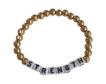 STRENGTH Gold Hematite Beaded Bracelet