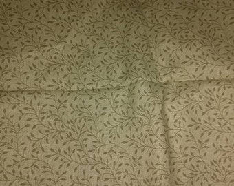 Tissu de coton beige avec design de feuille