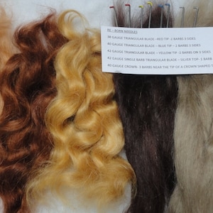 May include: A variety of hair fibers in different colors, including blonde, brown, and black. The fibers are labeled with their gauge and type, such as "43 Gauge Crown, 3 Barbs near the tip of a crown shaped tip - Brown Tip".