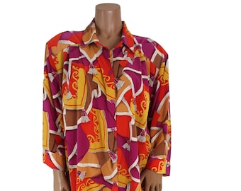 Blusa vintage de mujer con estampado abstracto y colores vivos...