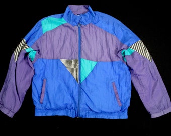 May include: A blue, purple, and green color block windbreaker jacket with a zipper closure.