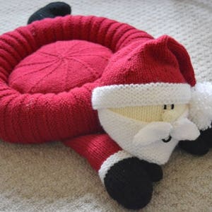 PDF KNITTING PATTERN Santa Snuggler Pet Bed Child's Cushion Knitting Pattern Download From Knitting by Post image 1