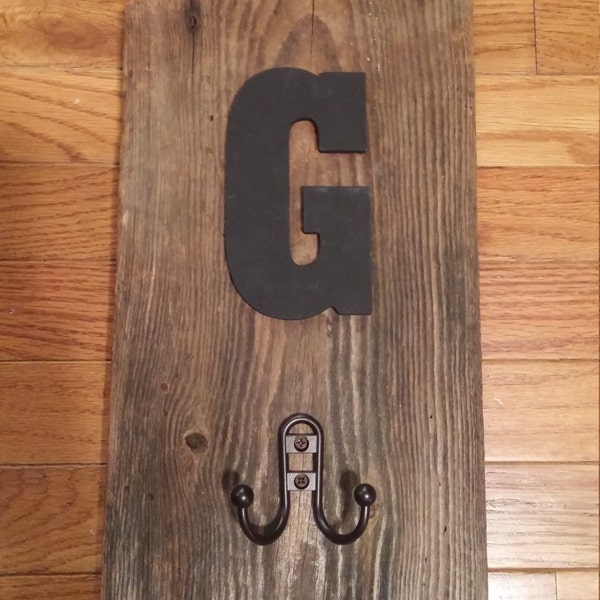 Personalized rustic coat, hat, or backpack storage rack made with vintage weathered gray barnwood with a metal hooks