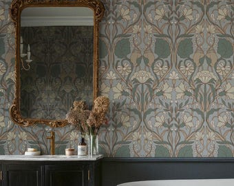 May include: A bathroom with floral wallpaper in shades of gray, green, and beige. A gold-framed mirror hangs above a black vanity. A white bathtub with gold feet is in the foreground.