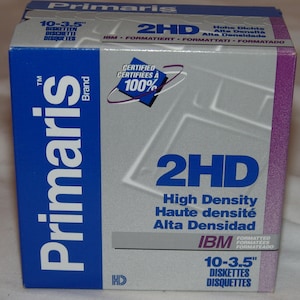 May include: A blue and white box of 10 3.5-inch 2HD high density floppy disks. The box is labeled "Primaris" and "IBM Formatted".