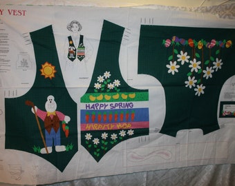 May include: A green fabric pattern for a vest with a bunny rabbit, flowers, and the text "Happy Spring" and "Happy Hop".