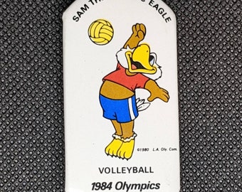 Juegos Olímpicos de Los Ángeles 1984 Sam The Eagle "Voleibol" Pin/Button - NUEVO