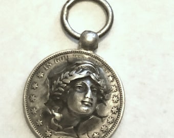 Antique US Half Dollar. 1909 Barber Punched Coin Fob.