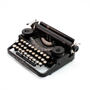 Restored Underwood Standard Portable (3-Bank) typewriter, black