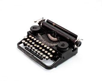 Restored Underwood Standard Portable (3-Bank) typewriter, black