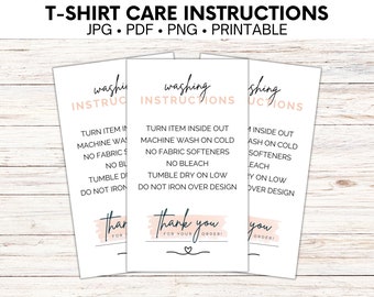 May include: Three printable cards with instructions for washing a t-shirt. The cards are white with black text and a pink brushstroke design. The text on the cards reads: "Washing Instructions", "Turn item inside out", "Machine wash on cold", "No fabric softeners", "No bleach", "Tumble dry on low", "Do not iron over design", and "Thank you for your order!"