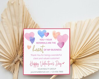 May include: Pink and blue watercolor hearts on a white background with the text "YOU + YOUR REFERRALS ARE THE heart OF MY BUSINESS Thank You for being a wonderful client and valued customer! Happy Valentine's Day YOUR REALTY GROUP youremail@email.com | 123-456-7890"