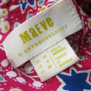 May include: White tag with black text that reads "Maeve by Anthropologie". The tag also includes size information in UK, US, and EU sizes. The tag is made in Indonesia.