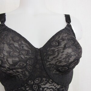 May include: Black lace bra with adjustable straps. The bra has a floral pattern and is made of a soft, stretchy material.