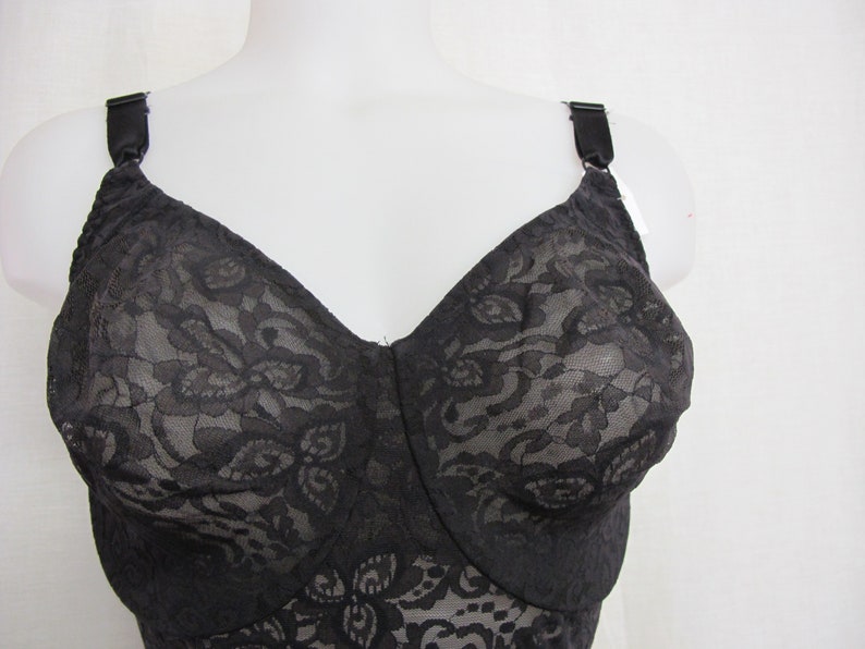 May include: Black lace bra with adjustable straps. The bra has a floral pattern and is made of a soft, stretchy material.