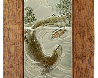 River otter art tile framed in quarter sawn oak, Totally Preoccupied 4x8 inch tile framed ready to hang.