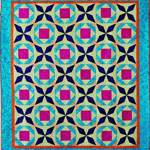 May include: A quilt with a geometric pattern of stars and squares in shades of blue, green, pink, and orange.