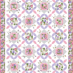 May include: A quilt with a floral pattern in shades of pink, purple, and white. The quilt is made up of squares and circles, and it features a border of pink and white flowers.