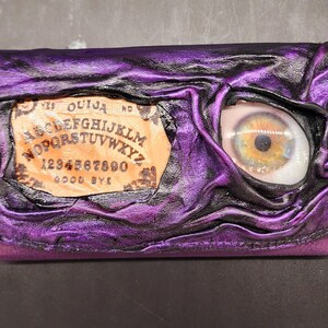 Cartera Ouija de cuero