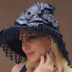 Creepy leather witch hat with spooky skull