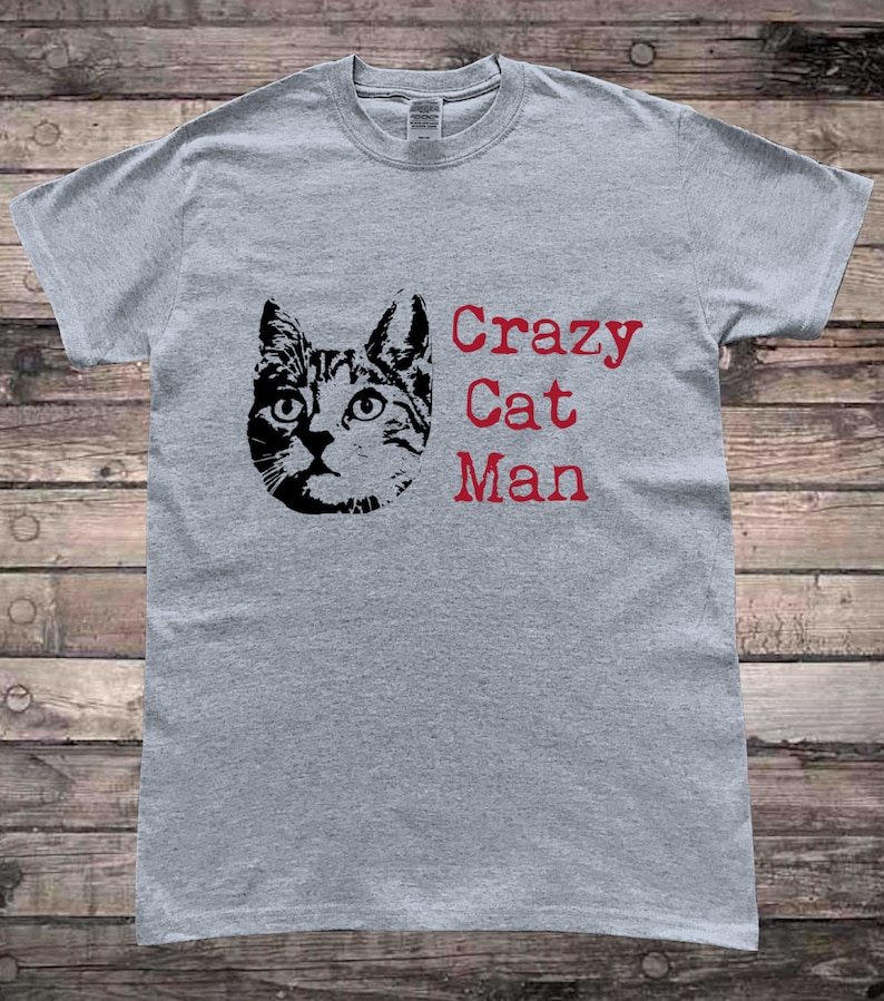 May include: Gray t-shirt with a black cat illustration and the text "Crazy Cat Man" in red.