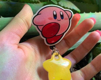 Super cute pink blob named Kirby badge reel great for any job that has I’d cards! Hospitals housekeeping