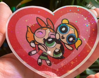 Powerpuff girls sticker or magnet! Super cute sparkly all three playing with the classic heart!