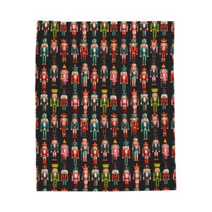 May include: A black background is covered with a repeating pattern of colorful nutcracker figures. The nutcrackers are in various colors, including red, green, pink, and blue, with gold accents. The figures are in a standing position.