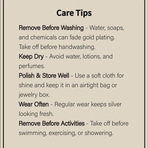 May include: A beige informational card titled Care Tips with black text. Instructions include: Remove Before Washing, Keep Dry, Polish & Store Well, Wear Often, and Remove Before Activities. It details how to maintain gold-plated and silver jewelry.