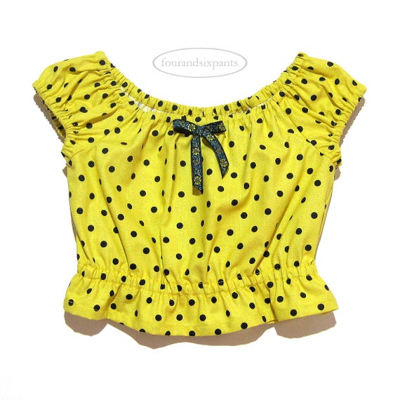 girls yellow blouse