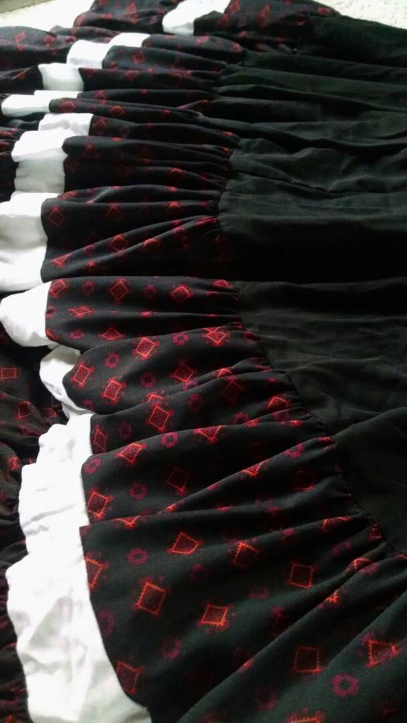 Black and Red patterned stripes with Black body and White stripes 25 yard performance skirt