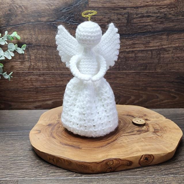 38 Crochet Patterns Inspired by Angels: Heavenly, Whimsical, and Giftable Crochet Ideas 6 Raquel Crochet Angel