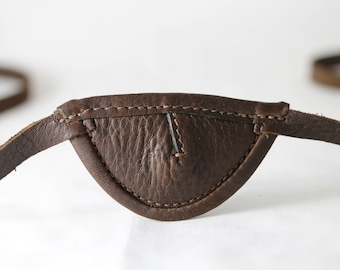 Slim, brown, convex - leather eye patch
