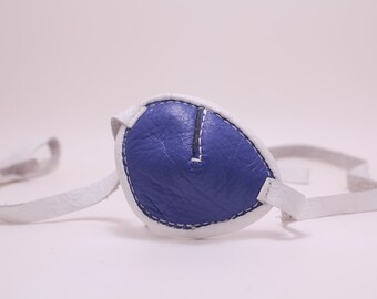 Blue and white leather eye patch