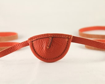 Parche de cuero para el ojo, delgado, naranja y convexo