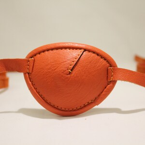 Orange leather eye patch