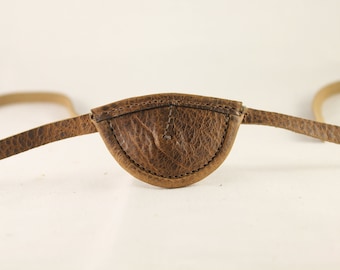 Slim, distressed brown, concave - leather eye patch