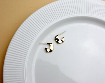 Small crescent-shaped gold-plated hoop earrings