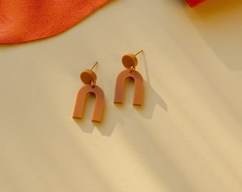 Mini Arch acrylic earrings with stainless steel plugs in terracotta