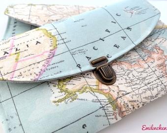 Water-repellent travel case with world map motif for globetrotters