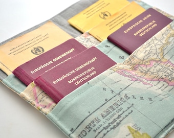 Travel case, vaccination certificate, passport, world map