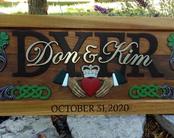 Irish Claddagh , Celtic knotts, clover accents, carved wood