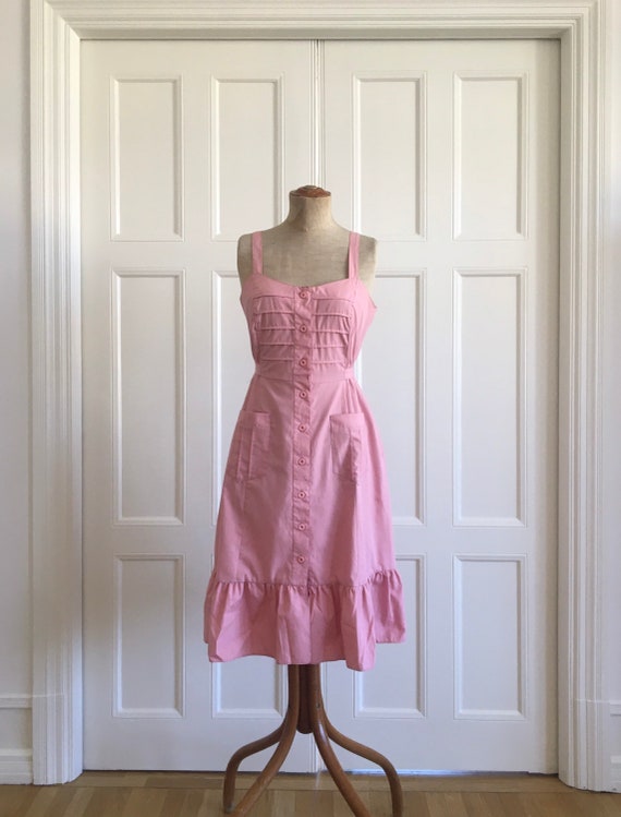 Pink 70s apron dress