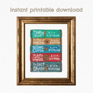 May include: A framed print featuring a stack of colorful book spines. The titles include "The Lightning Thief," "The Sea of Monsters," "The Titan's Curse," "The Battle of the Labyrinth," and "The Last Olympian." The author's name, Rick Riordan, is also visible. The frame is gold.